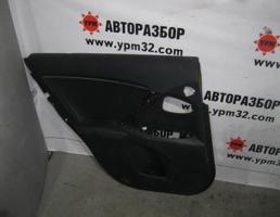 Обшивка двери задней левой для Toyota Avensis III 2009-2011  запчасти бу